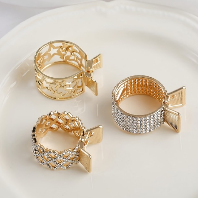 Komplet 3 zlatih sponk za visok čop – zvezdice, mreža in kristalčki