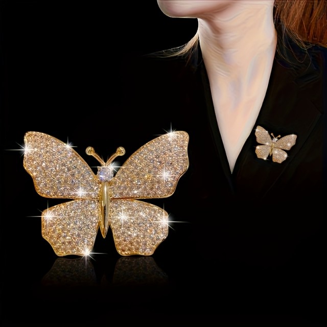 Elegantna broška z metuljem srebrne barve