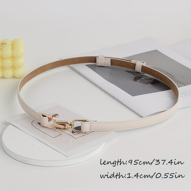 Ženski nastavljiv pas z zaponko s kovinskimi detajli