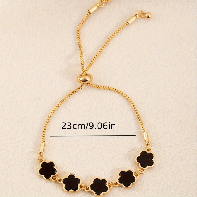 Elegantna zlata zapestnica s črnimi cvetovi – nastavljiva dolžina 2 barvi