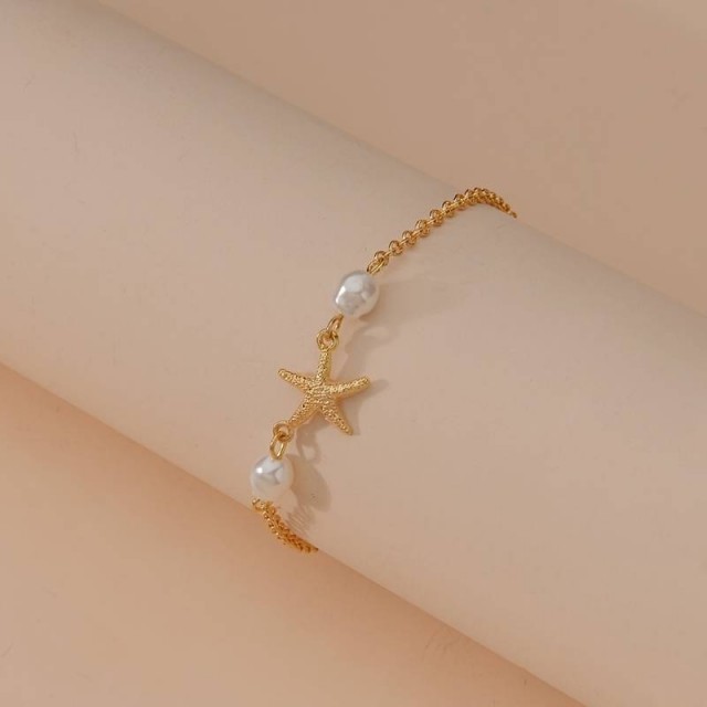 Preprosta zlata zapestnica za nogo, z morsko zvezdico