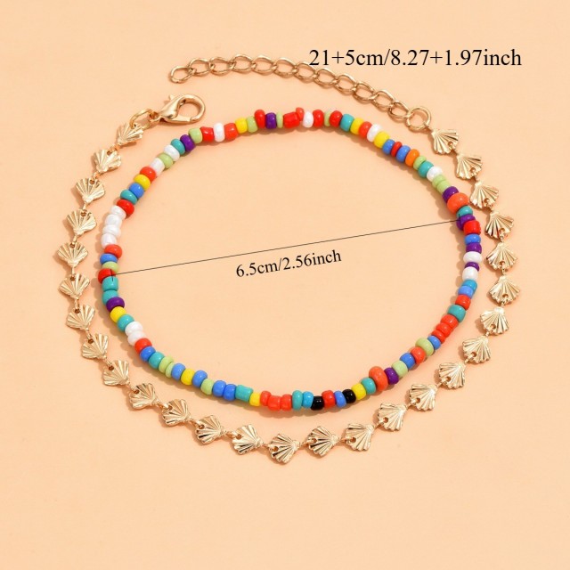 Dvojna zapestnica s školjkami in barvnimi perlicami