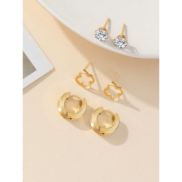 Set uhanov v zlati barvi s štiriperesno deteljico