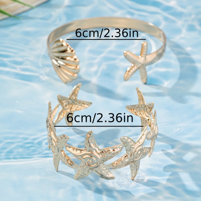 Komplet 2 zlatih nastavljivih zapestnic z morskim motivom