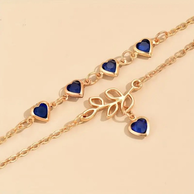 Dvodelni komplet zapestnic za nogo z modrimi srci