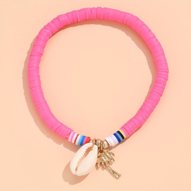 Pink zapestnica za nogo s školjkico in palmo