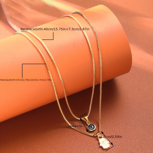 Dvojna ogrlica v srebrni barvi z Evil oko in Fatimo obeskom, odganja zlo