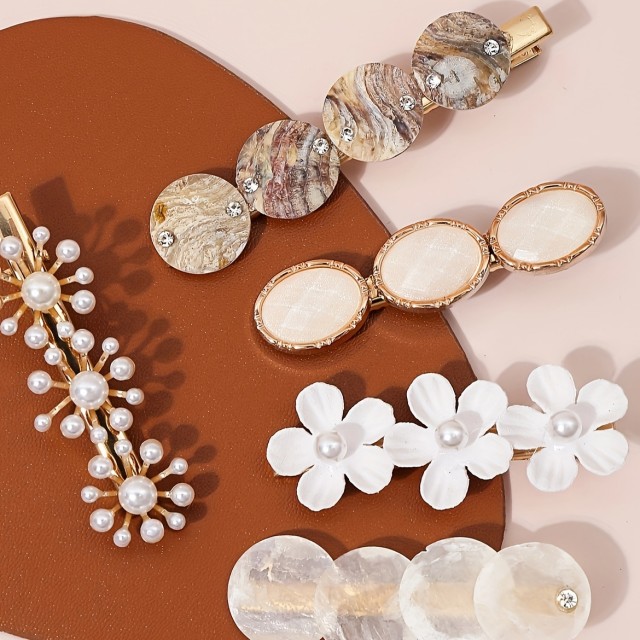 Komplet 6 lasnih sponkic v beli barvi