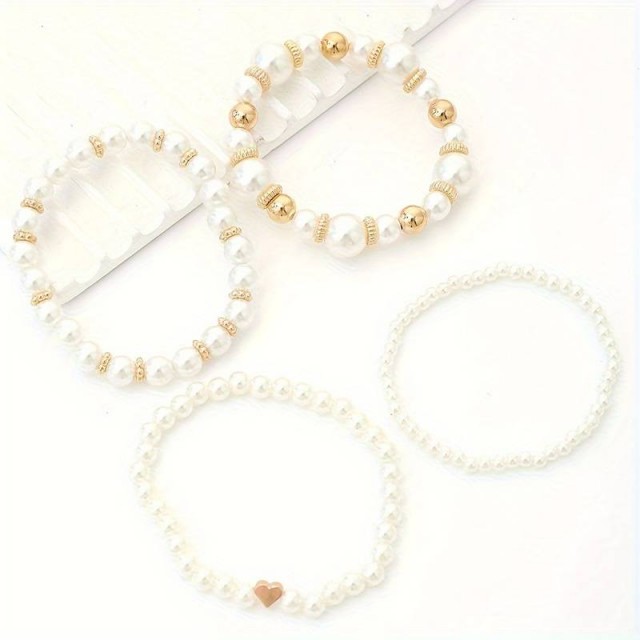 Komplet 4 zapestnic v belo-zlati barvi, s perlicami