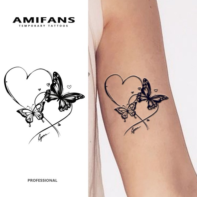 Črna začasna tetovaža z metuljem in srcem