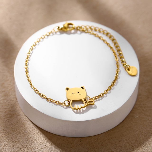 Prikupna zapestnica v srebrni ali zlati barvi z muco