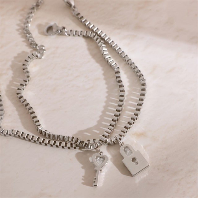 Komplet 2 zapestnic za pare s ključavnico in ključkom