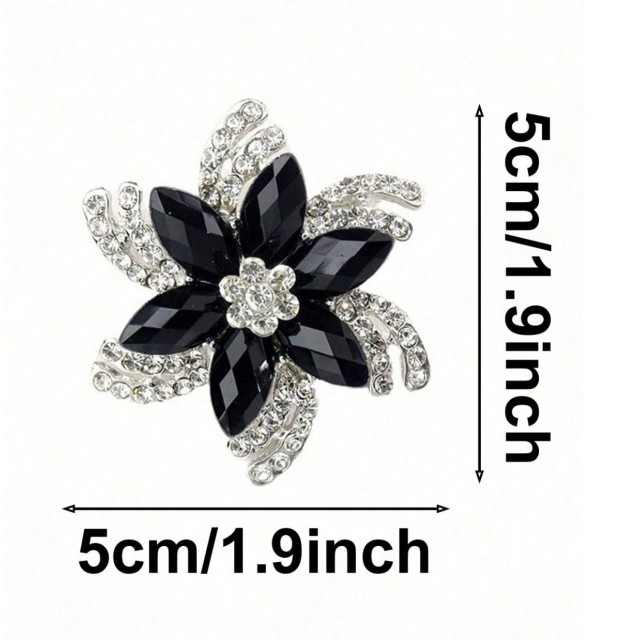 Elegantna broška rožica črne barve 