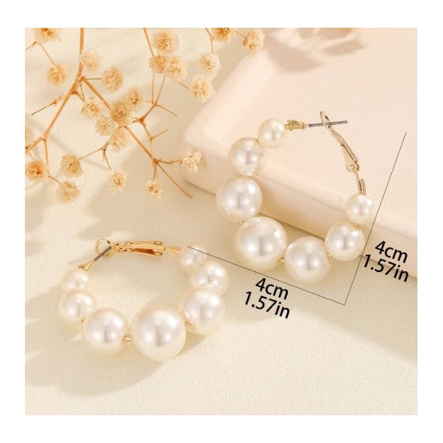 Okrogli zlati uhani s perlicami 