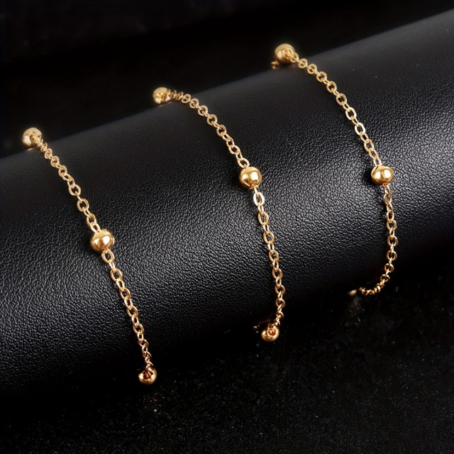 Daljša verižica v zlati barvi boemski videz