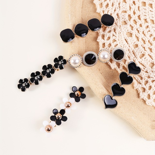 Komplet 5 lasnih sponkic v črni barvi