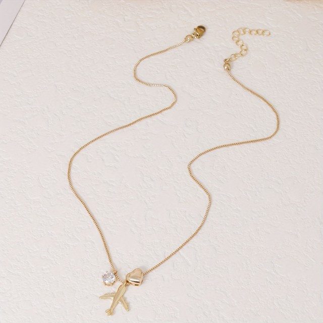 Elegantna ogrlica z letalom in srcem