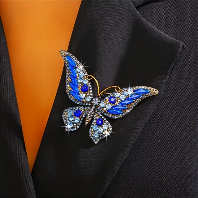 Sofisticirana modra broška v obliki metulja