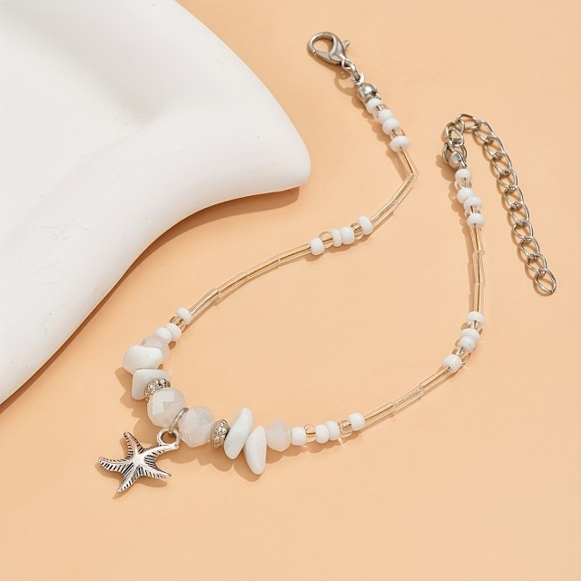 Prelepa zapestnica za nogo z belimi kamenčki in morsko zvezdo