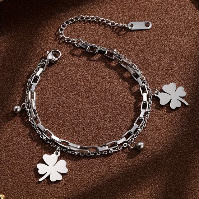 Elegantna zapestnica iz nerjavečega jekla z deteljicami