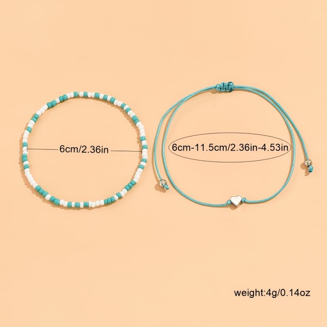 Dvodelna zapestnica v beli ali modri barvi s perlicami in srcem