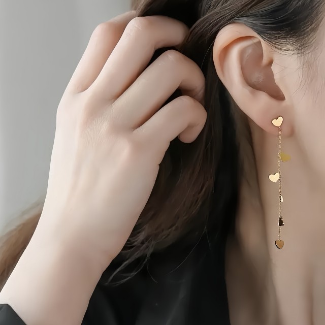 Viseči uhani s srčki zlate barve