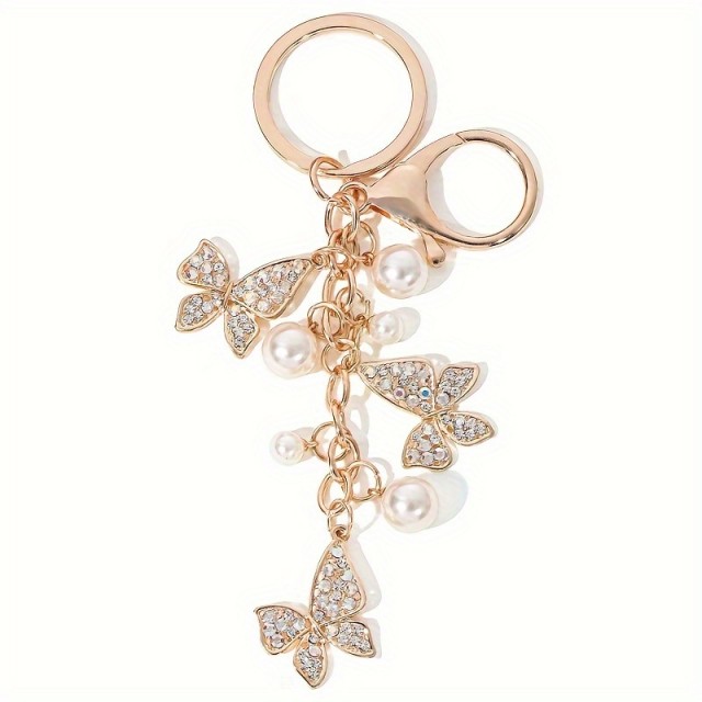 Obesek za ključe z metuljčki in perlicami