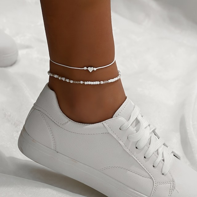 Dvodelna zapestnica v beli ali modri barvi s perlicami in srcem