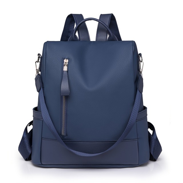 Ženski usnjeni nahrbtnik nastavljiv temno moder 