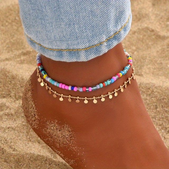 2 delni komplet zapestnic s pisanimi perlicami in okroglimi obeski