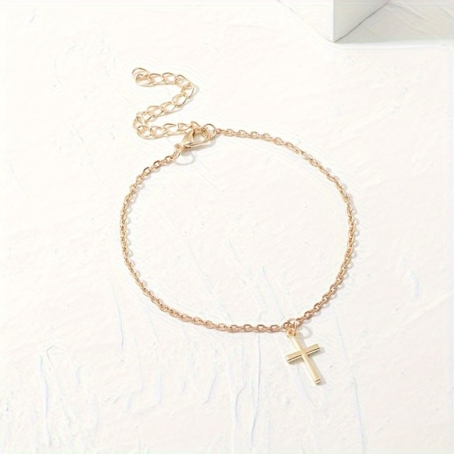 Zlata zapestnica za nogo s križem