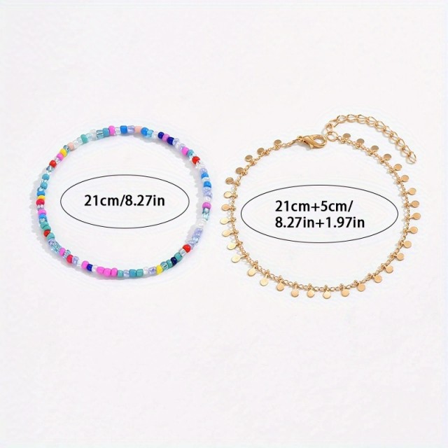 2 delni komplet zapestnic s pisanimi perlicami in okroglimi obeski