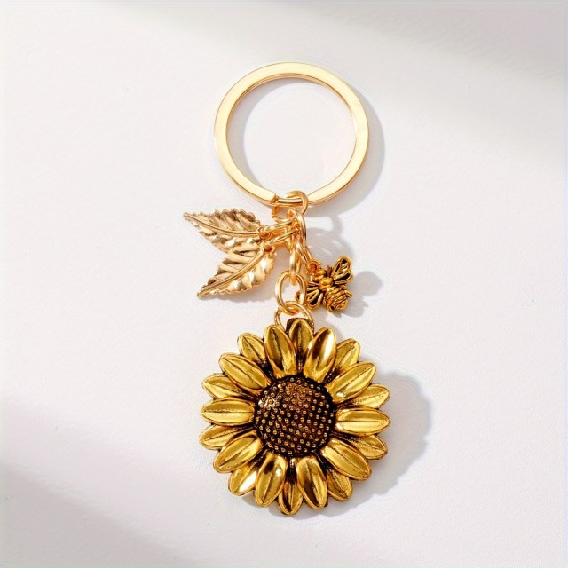 Obesek za ključe v zlati barvi sončnica