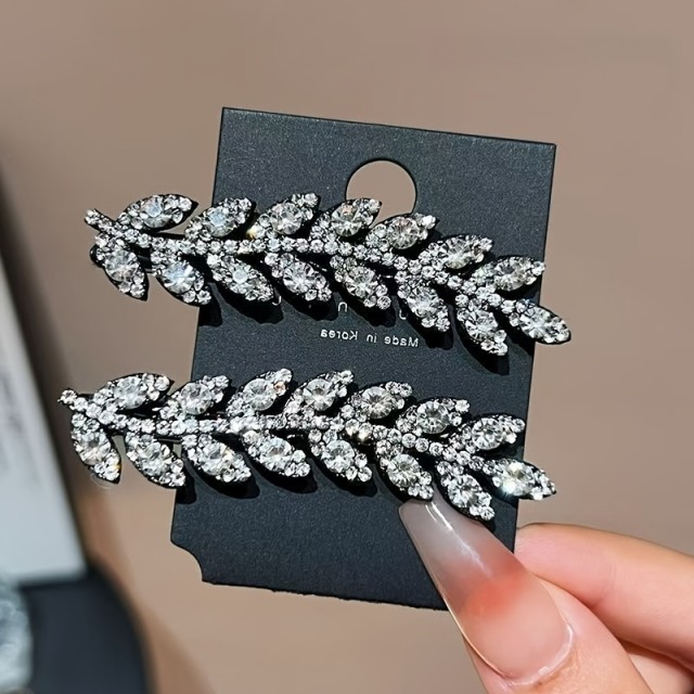 Komplet 4 sponk za lase z elegantnim dizajnom listov