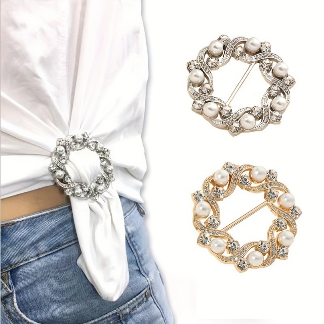 Elegantna broška z zlatimi cvetovi in kristali