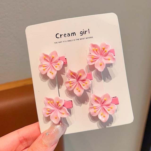 Komplet 5 sponkic za lase z roza rožami