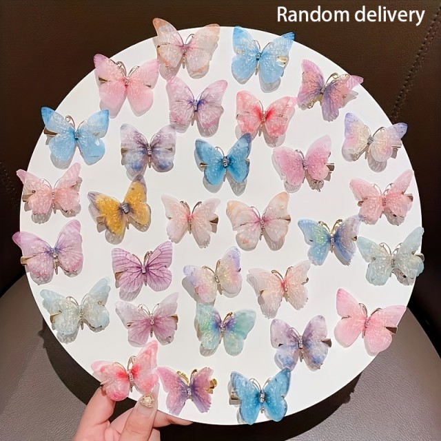 Komplet 6 pisanih sponk za lase v obliki metuljčka