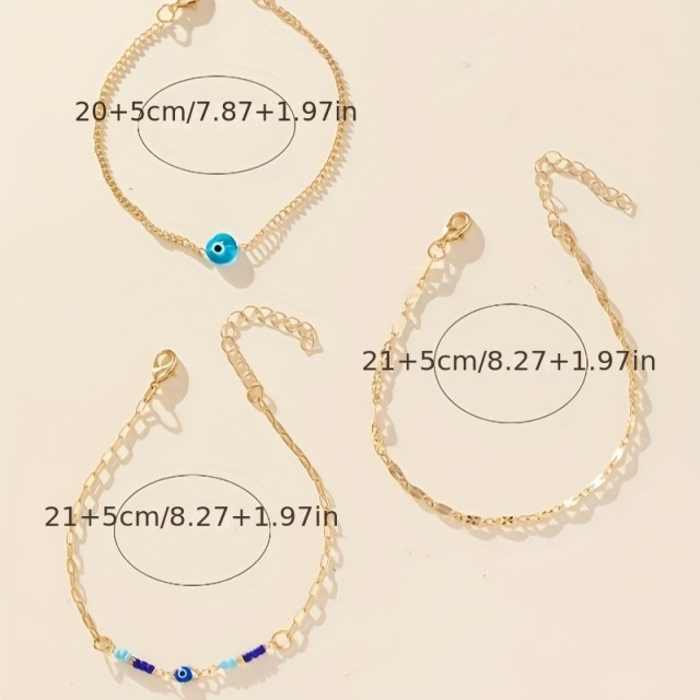 Komplet 3 zapestnic za nogo z modrim zaščitnim očesom in zlato verižico