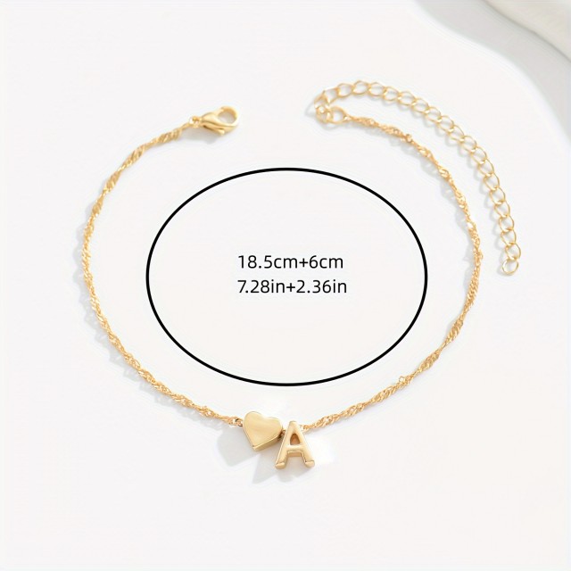 Nastavljiva zlata zapestnica za nogo z inicialko