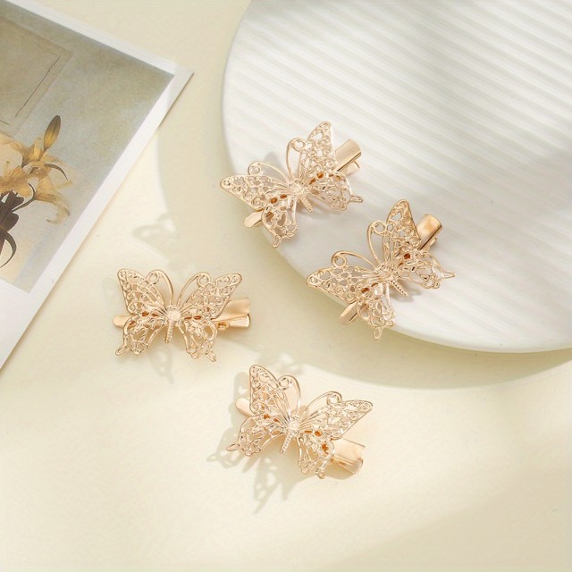 4 kosi srčkanih sponk za lase z zlatim metuljčkom