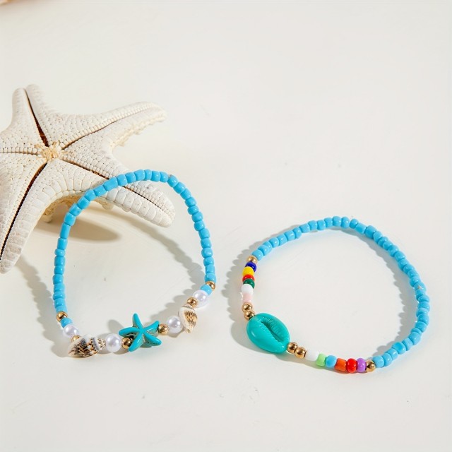 4 delni komplet zapestnic za nogo z ribico