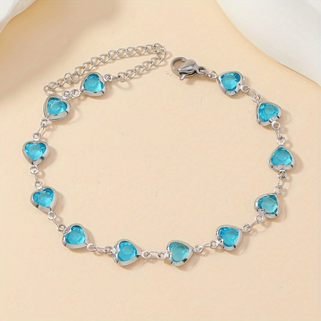 Elegantna zapestnica s srci v modri barvi 