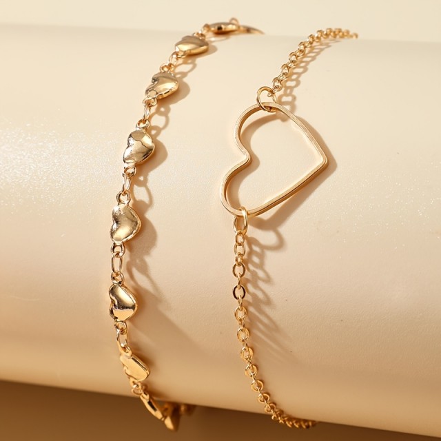 Dvojna zlata zapestnica za gleženj s srčki