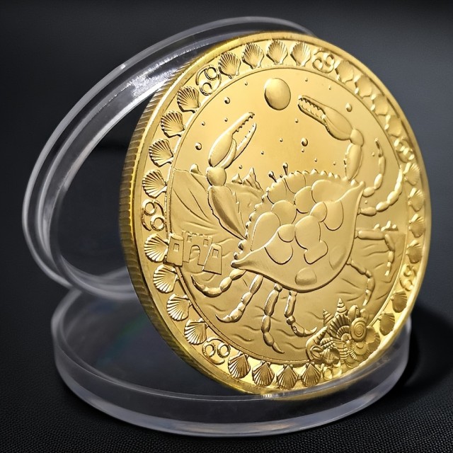 Spominski kovanec z astrološkimi znamenji