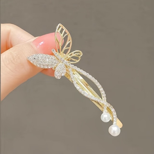 2 kosa lasnih sponk z umetnimi biseri in kristali v obliki metulja 