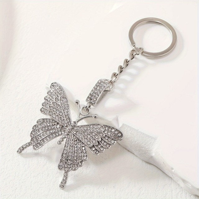 Prikupen obesek za ključe metuljček