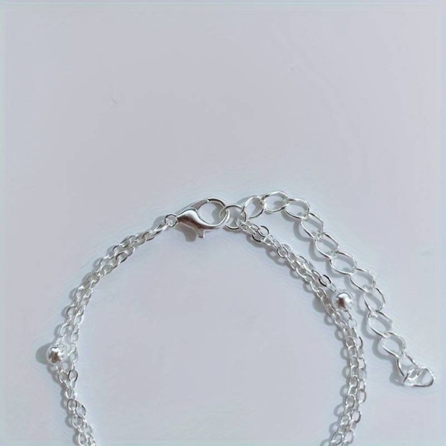 Dvodelna zapestnica s tačko v srebrni barvi