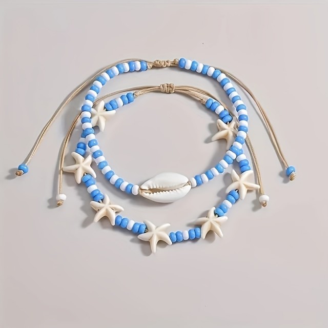 Komplet 2 poletnih zapestnic za nogo v modri barvi