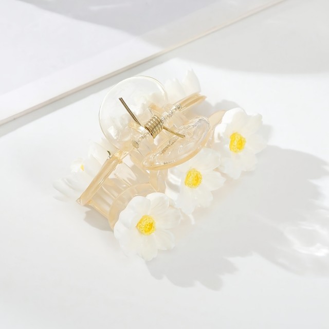 Čudovita plastična sponka za lase s cvetovi marjetic