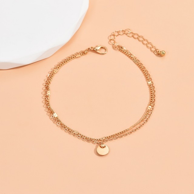 Dvojna zapestnica za nogo z obeskom krogca 2 barvi